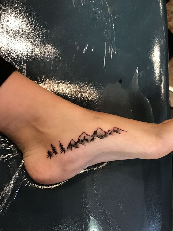 feet mountain tattoo