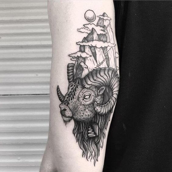 goat on mountain tattoo