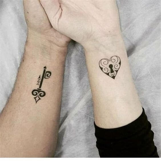 heart locket and key tattoo couples