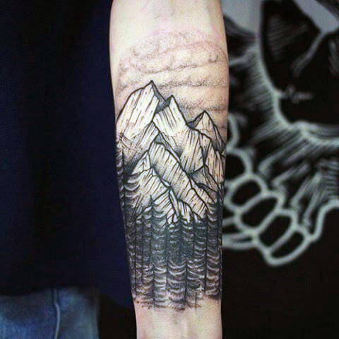 mountain tattoo on forearm