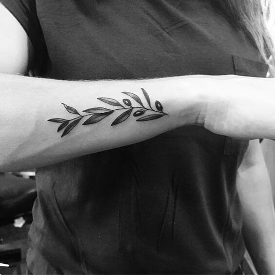 outer arm a leaf simple tattoo