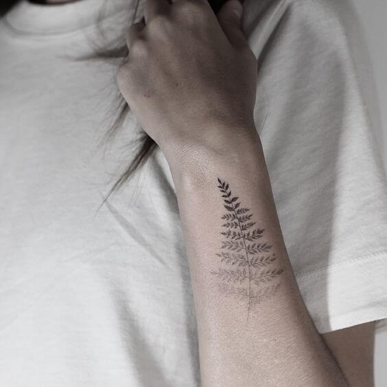 single leaf outline tattoo