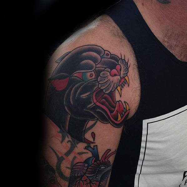 traditional Panther bicep tattoo