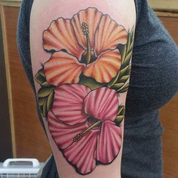 Black hibiscus tattoos with foliage