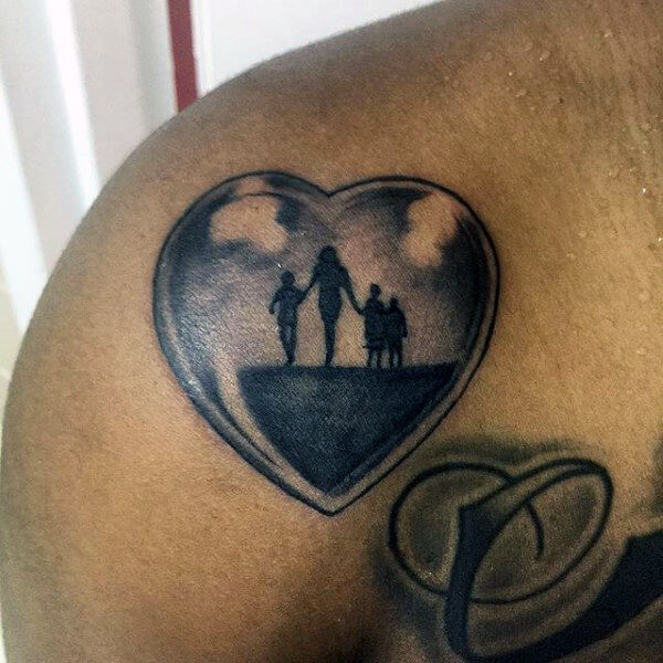Family Scene Inside a Heart tattoo