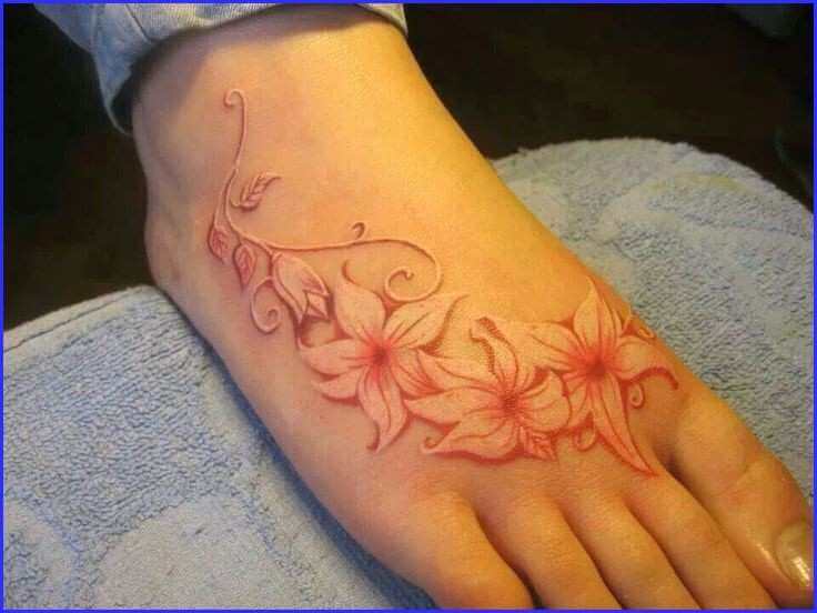 white Hibiscus flowers tattoo on feet
