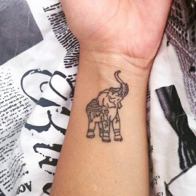 elephant tatoo on hand