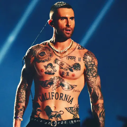 X tattoo adam levine