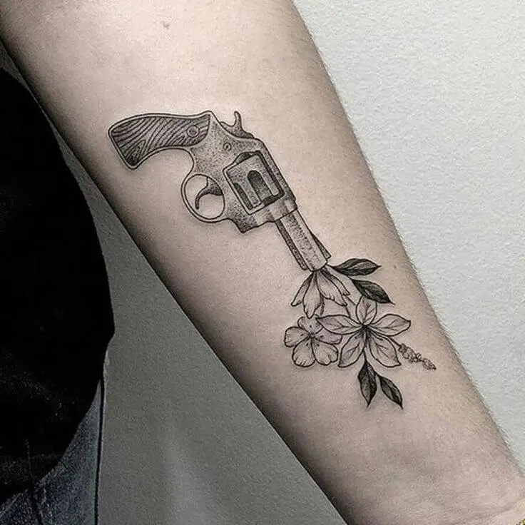 holstered pistol tattoo