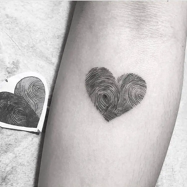 Couple tattoo  fingerprint heart tattoo  Fingerprint tattoos Couple  tattoos unique Fingerprint heart tattoos