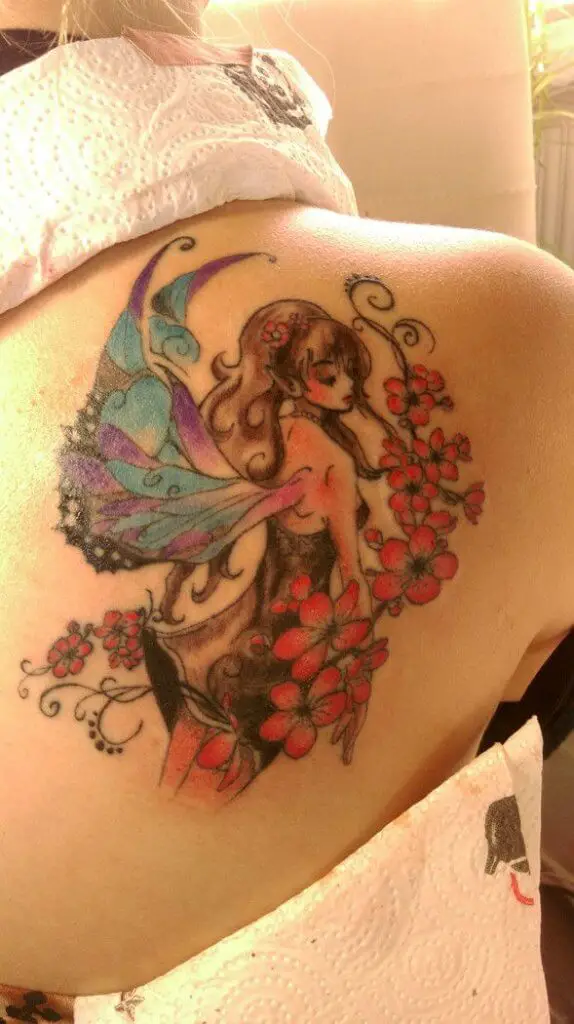 fairy tattoo with magnolia