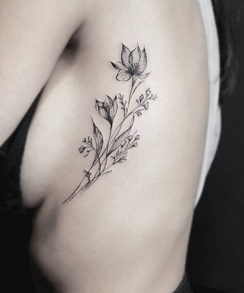 Intricate Flower Rib Tattoo