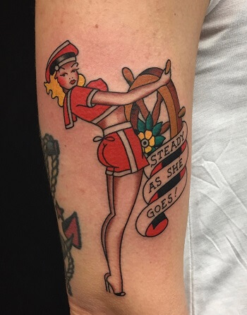Traditional pin-up girl tattoo
